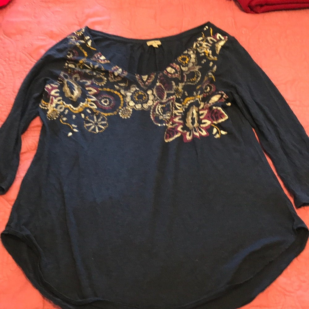 Navy top with flower detailing!